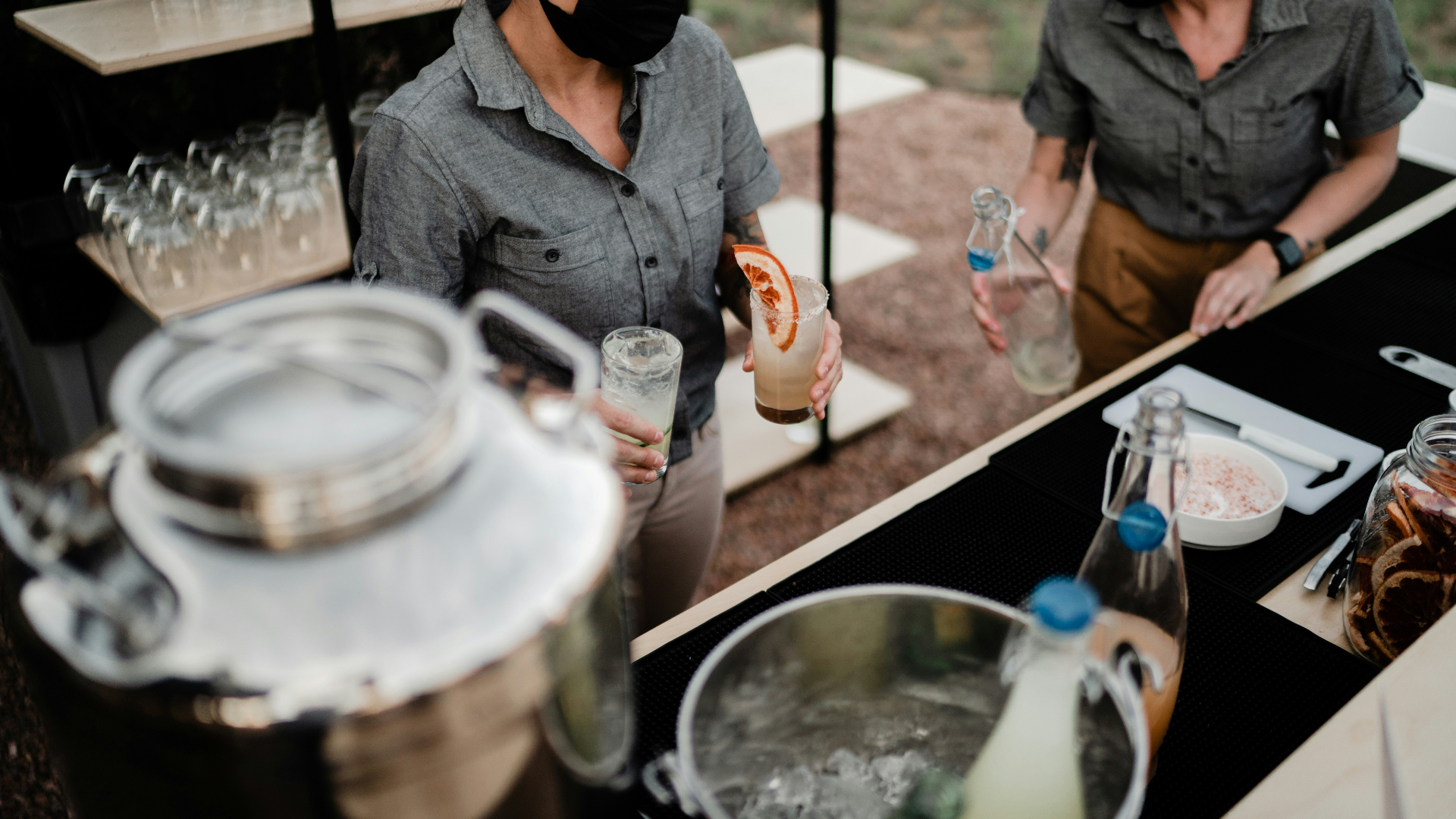Posies bartenders serving at an outdoor event